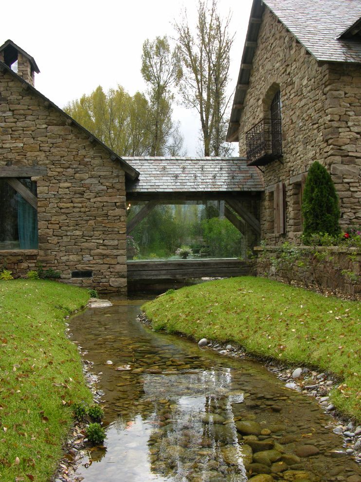 Swedish Mill Creek with Traditional Landscape Also Balcony Creek Gable Roof Glass Walls Grass Landscape Design Retaining Wall Rocks Shingles Stacked Stone Stream Topiary
