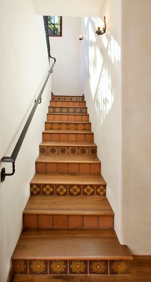 Terracotta Tile Home Depot with Mediterranean Staircase  and Metal Railing Mexican Tile Mission Revival Panted Tiles Sconces Spanish Colonial Terracotta Tile Wood Stairs