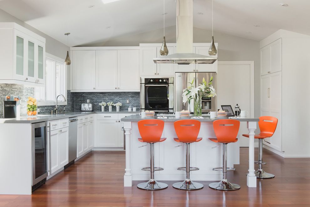 Tj Maxx Stools with Transitional Kitchen Also Flowers Gray Wall Grey Counters Orange Counter Stools Pendant Lighting Stainless Appliances Vase Vaulted Ceilings Vent Hood White Cabinets White Door White Kitchen Window Wood Floors