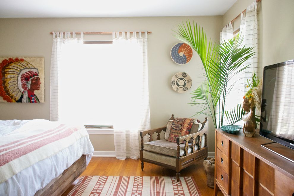 Tree Removal Montgomery Tx with Eclectic Bedroom  and Beige Wall My Houzz Native American Art Natural Lighting Ornate Wood Bed Rustic Wood Bed Sheer Curtains Wall Mounted Bowls White Bedding Wood Chair Wood Dresser Wood Floor