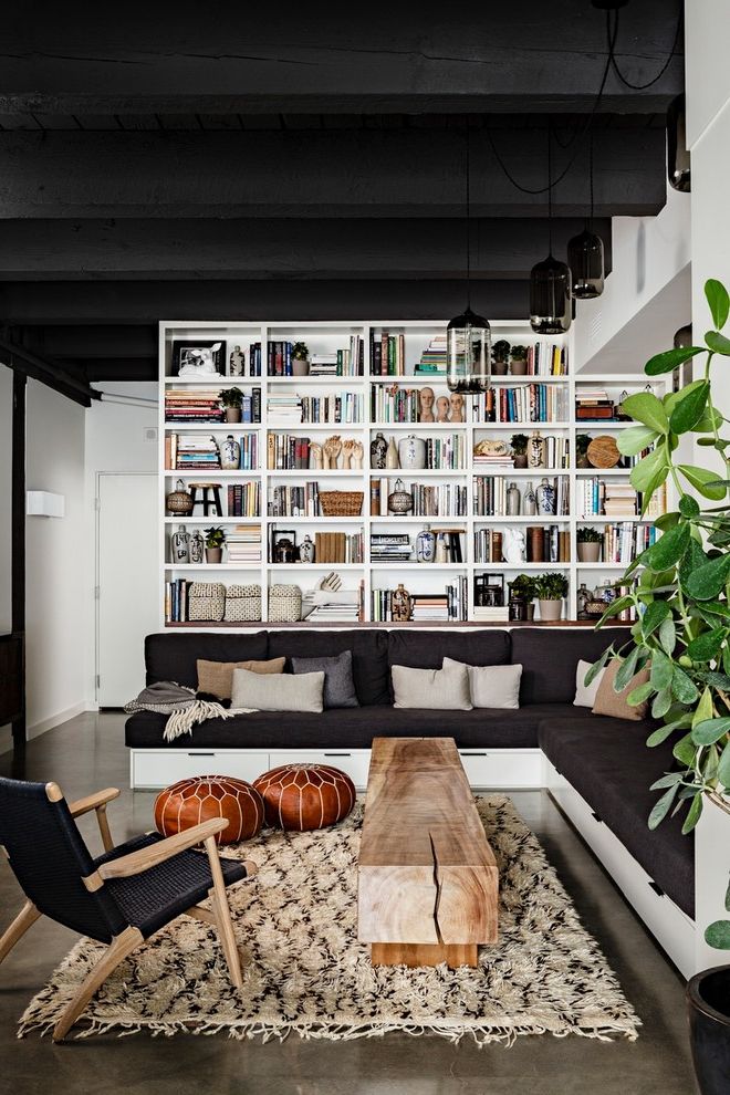 Woven Rag Rugs for Sale with Industrial Living Room  and Black Ceiling Black Sofa Black Wood Beam Built in Shelves Chair Corner Sofa Painted Wood Beam Pendant Light Plant Pouf Rug Shelves Sofa Timber White Bookcase Wood Beam Wood Table
