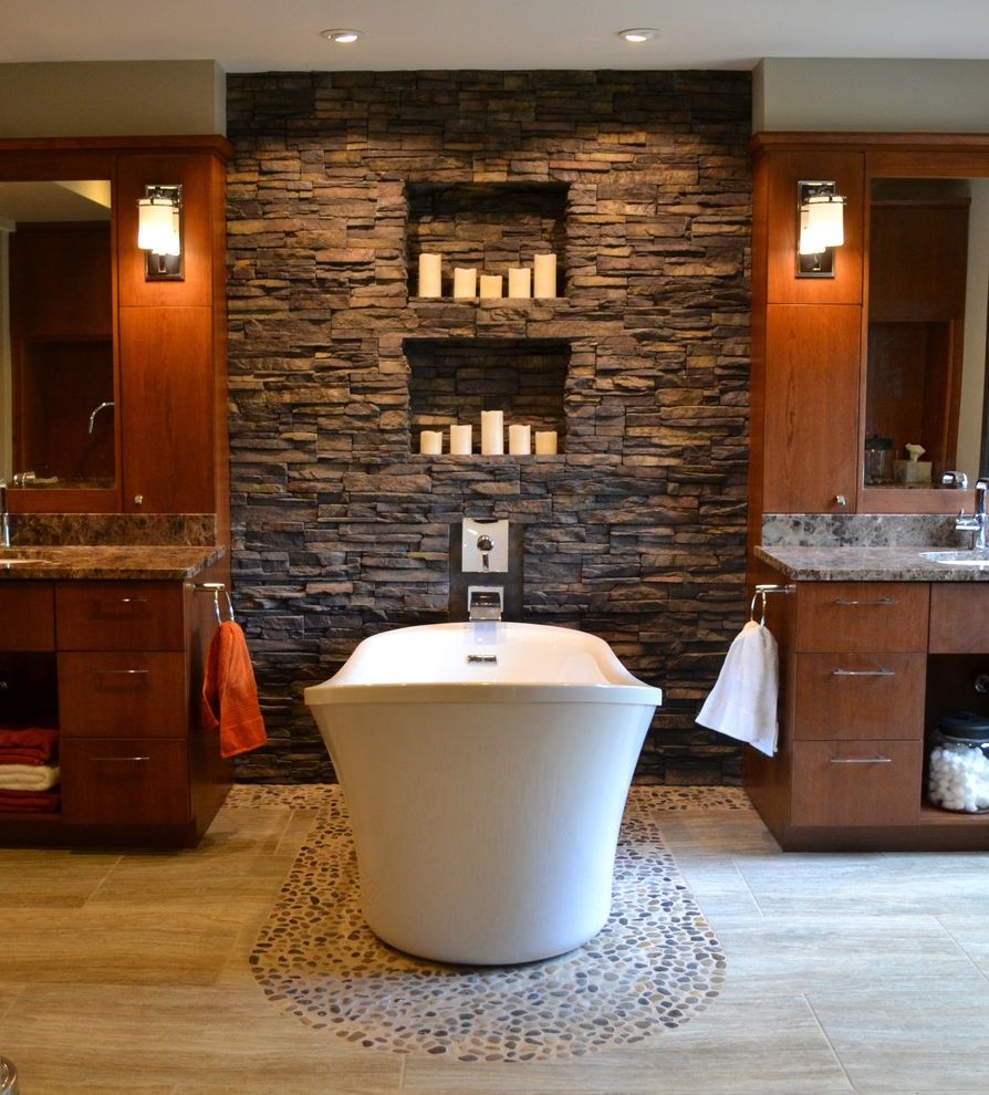 Www.havertys.com   Contemporary Bathroom  and Bathroom Mirror Beige Floor Candle Nook Candles Dark Wood Cabinets Dark Wood Drawers Double Bathroom Vanity Freestanding Tub River Rock Floor Stacked Stone Wall Wall Nook Wall Sconce
