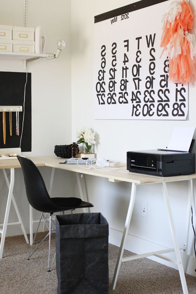 Menards Moving Boxes with Modern Home Office  and Black Plastic Chair Corner Desk Desk Chair Minimal Neutral Colors Oversized Calendar Trestle Desk Wall Shelves