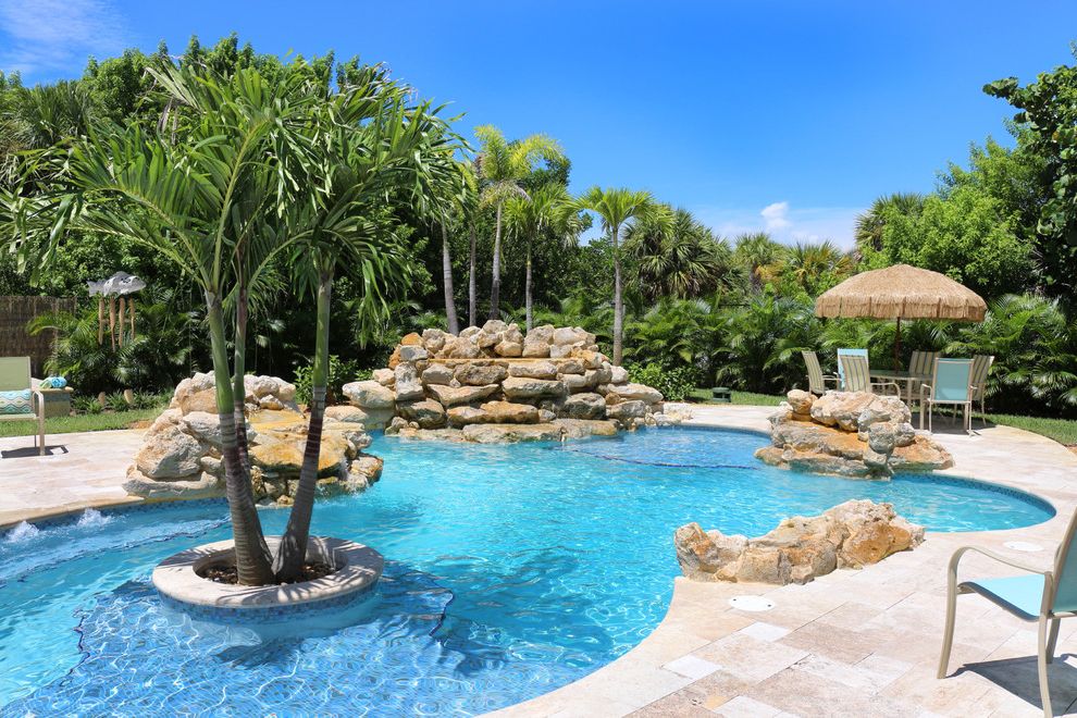 Paradise Tree Service with Tropical Pool Also Beach Boulders Contemporary Curved Pool Eclectic Florida Grass Umbrella Green Antiques Ocean View Palm Trees Stone Tropical Vero Beach