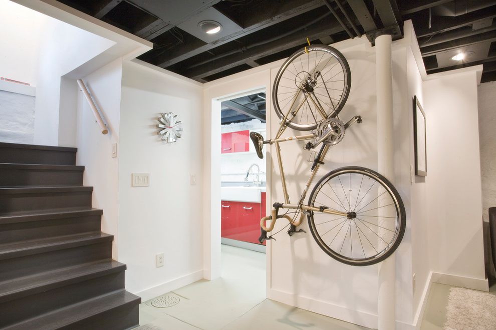 Radon Tester Lowes   Modern Basement  and Apron Sink Bar Basement Renovation Bike Storage Black Painted Ceiling Exposed Floor Joists Farm Sink Hanging Bike High Gloss Media Room Red Cabinets Staircase Wall Clock White Walls