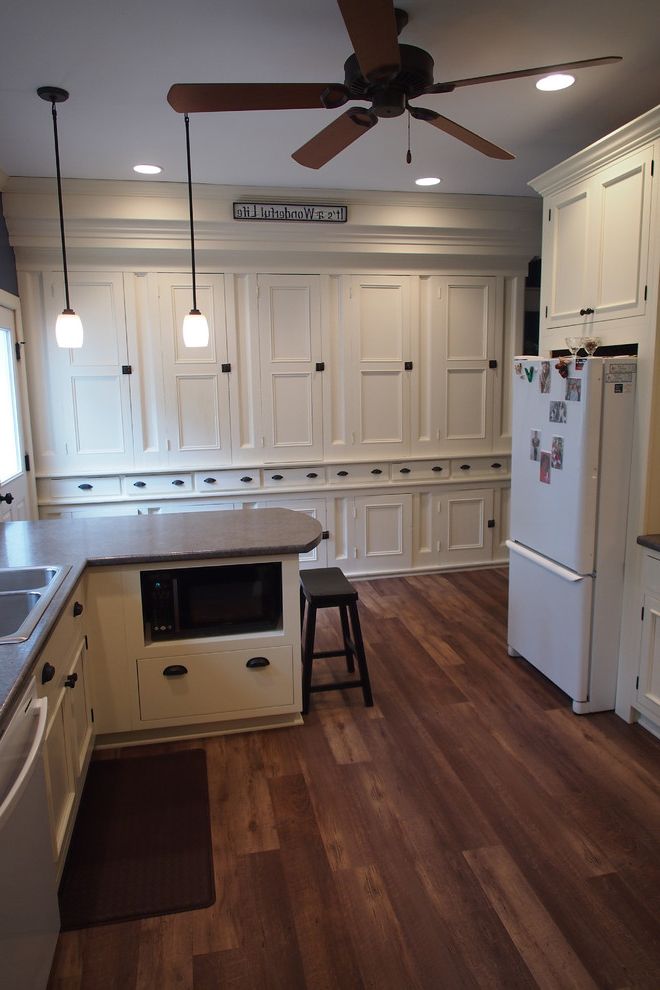 Home Depot Vinyl Plank Flooring with Farmhouse Kitchen  and Farmhouse Farmhouse Kitchen Grand Rapids Kitchen Kitchen Remodel Laminate Countertop Mission Shaker Thompson Remodeling White Cabinets White Kitchen