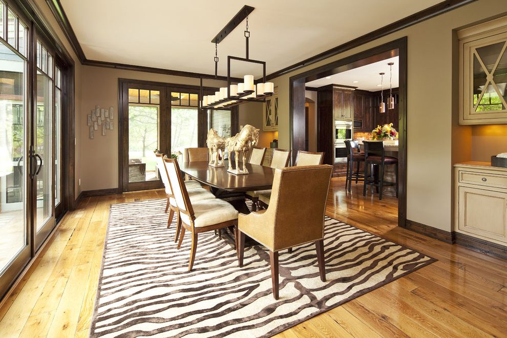 How to Stain Dark Wood Lighter with Contemporary Dining Room  and Beige Built in Cabinets Chandelier Dark Stained Wood Dark Wood Trim French Doors Sliders Upholstered Chairs Wood Floor Zebra Print Rug