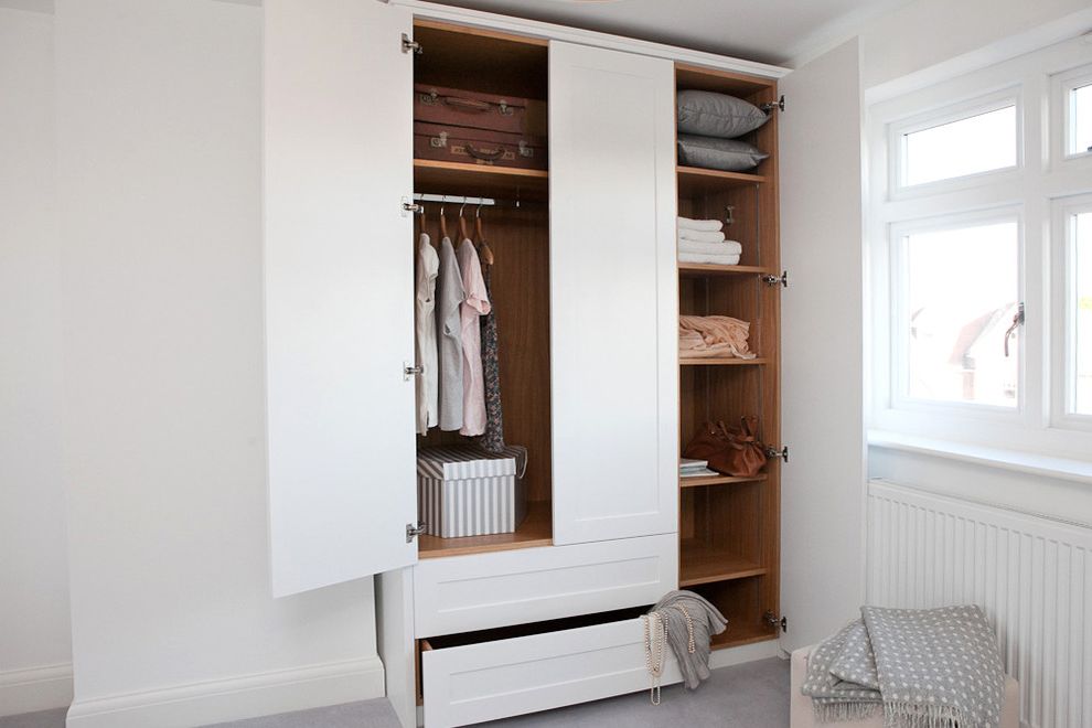 Children's Jewelry Box    Closet  and Armoire Carpeting Frame and Panel Shaker White Painted Oak Hat Box Leather Suitcases Wall Radiator Wardrobe White Walls
