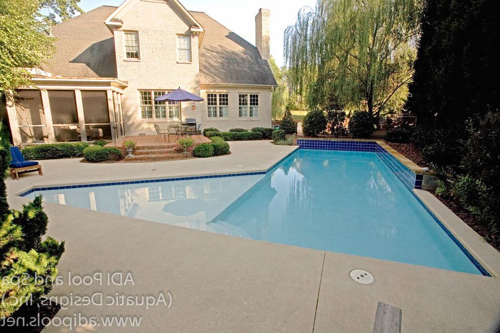 Greensboro Pools   Contemporary Pool  and Concrete Pool Sunshelf Swimming Pool Tile Retaining Wall