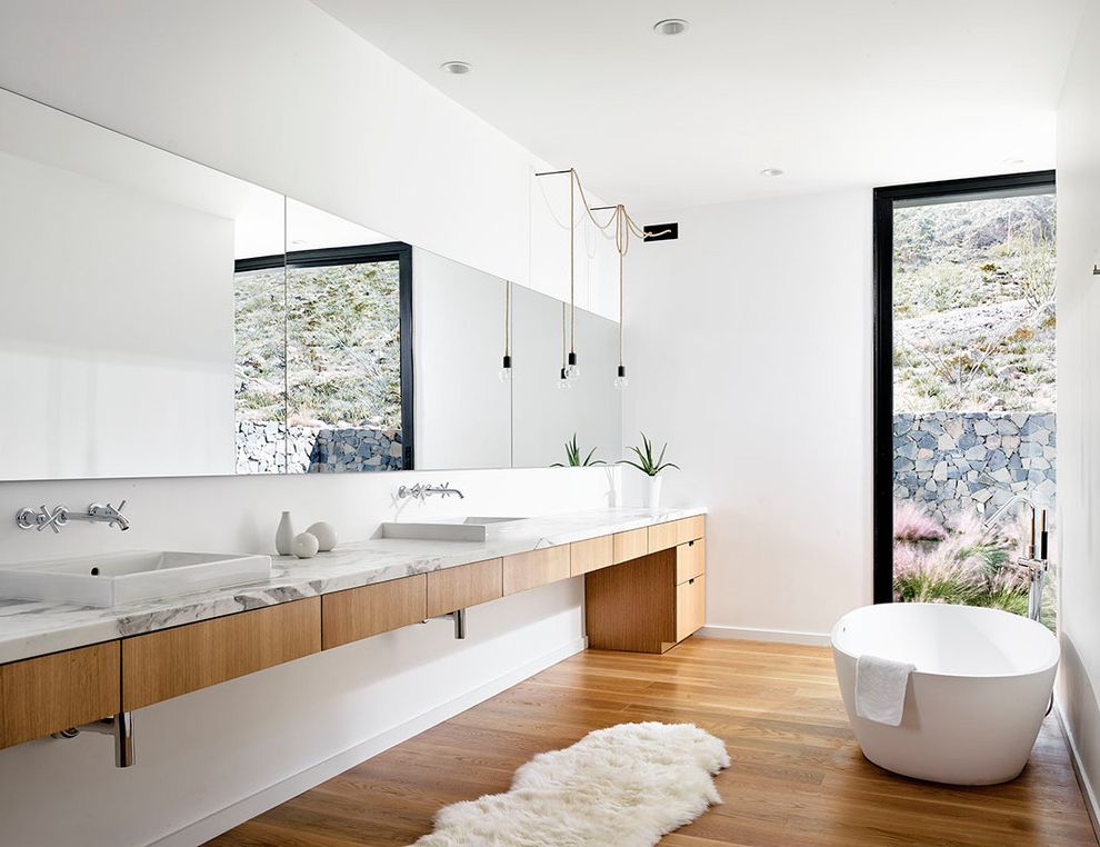 Latitudes Apartments   Modern Bathroom Also Black Window Frame Bulb Pendants Double Vanity Horizontal Mirror Sheepskin Rug Wall Length Vanity Wall Mount Faucet