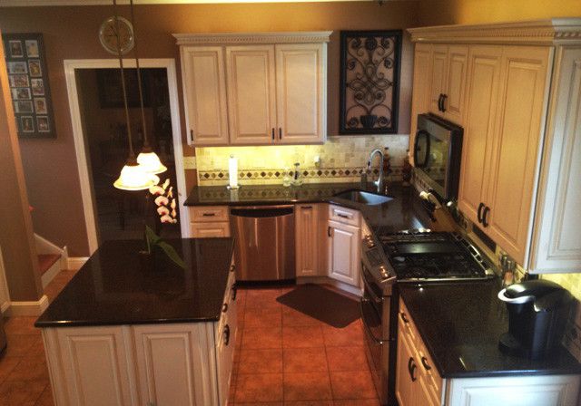 Lowes Henderson   Traditional Kitchen Also Cream Colored Cabinets Lowes of Lake Elsinore Quartz Countertop Stacked Moulding Stone Listello Stone Mosaic Backsplash