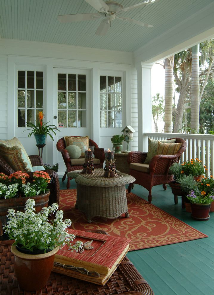Lowes Lafayette   Eclectic Porch Also Beadboard Ceiling Blue Ceiling Ceiling Fan Glass Door Haint Blue Painted Porch Floor Patio Porch Rug Potted Plants Wicker Chair Wicker Furniture Wicker Table