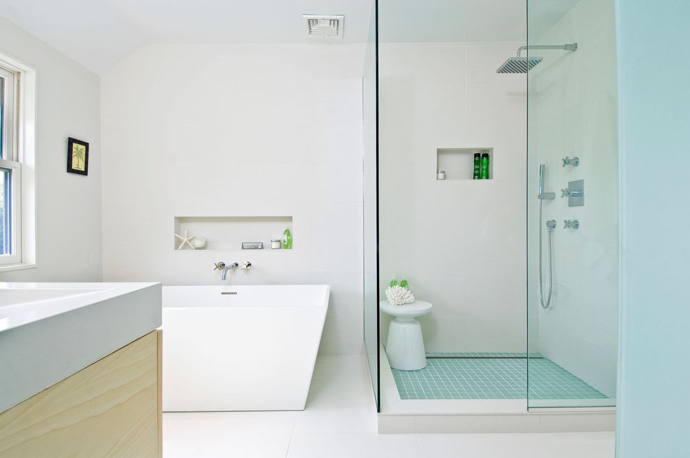 Moen Shower Valves   Contemporary Bathroom  and Freestanding Bathtub Glass Shower Enclosure Natural Wood Niche Square Shower Head Tile Floor Vanity White Counter White Walls