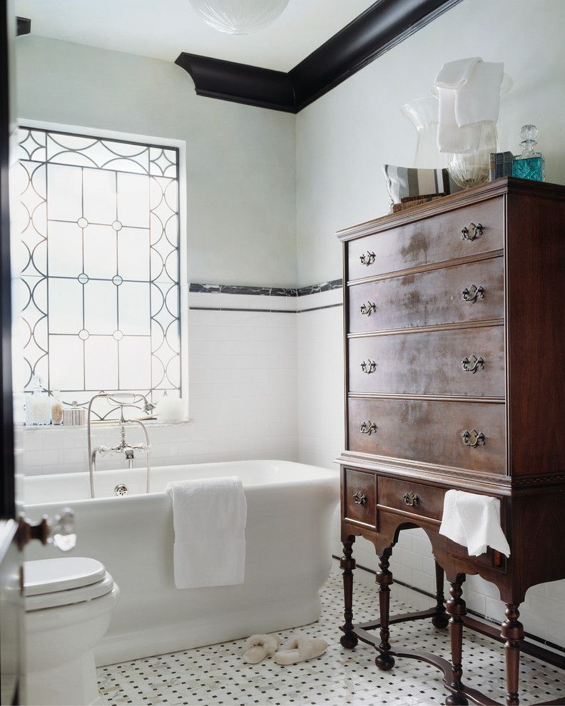 Used Furniture Fort Collins   Victorian Bathroom Also Accent Window Black and White Floor Black Crown Molding Black Molding Molding Soaker Tub Tiled Wall Tub White Tile Window Wood Cabinet