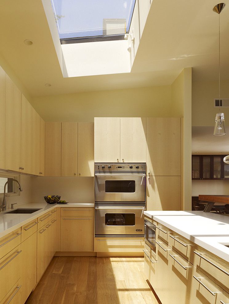 Velux Skylight Sizes with Modern Kitchen  and Ceiling Lighting Kitchen Hardware Kitchen Island Modern Fixtures Open Plan Recessed Lighting Skylight Skylights Stainless Steel Appliances Wood Cabinets Wood Flooring