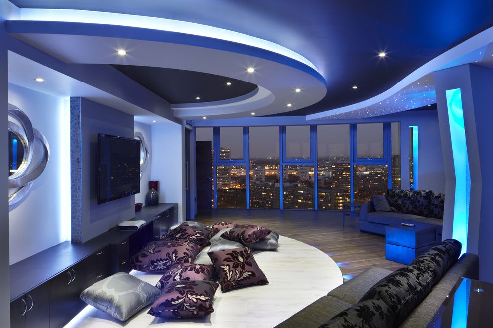 Blue Sky Pest Control with Contemporary Home Theater  and Area Rug Blue Bedroom City Cove Lights Curved Walls Damask Lounge Media Cabinet Mirrors Recessed Lights Seating Area Sky Line Sofa Soffit Tray Ceiling Urban Wall Mount Tv Wood Floor