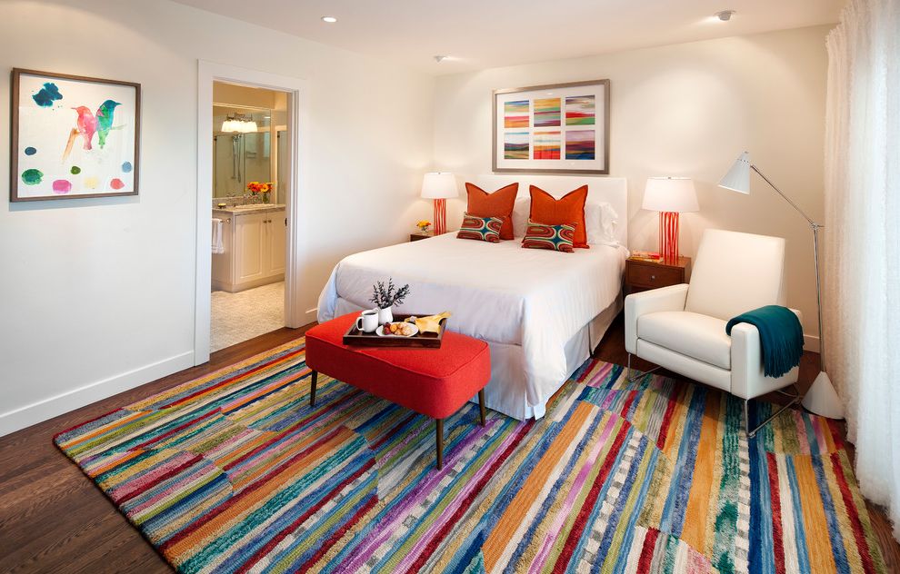 Wayfair.com Rugs   Traditional Bedroom Also Colorful Colorful Artwork Colorful Rug Comfort en Suite Guest Room Orange Lamp Red Bench Retreat Striped Area Rug Table Lamp White Bedding White Recliner White with Color