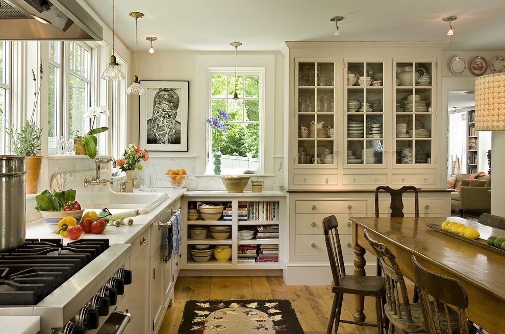 Woodmore Town Center   Farmhouse Kitchen Also China Cabinet China on Display Contemporary Artwork Pendants Porcelain Sink Rustic Chairs Rustic Table Small Spotlights Stone Backslash Wood Floor Wooden Chairs Wooden Table