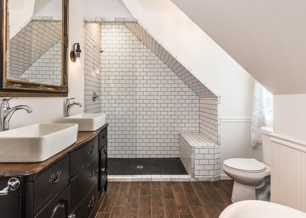 Porcelain Tile vs Ceramic Tile in Eclectic Bathroom 3x6 Subway Tile Classic Clawfoot Tubs Dresser Vanity Wood Look Tile