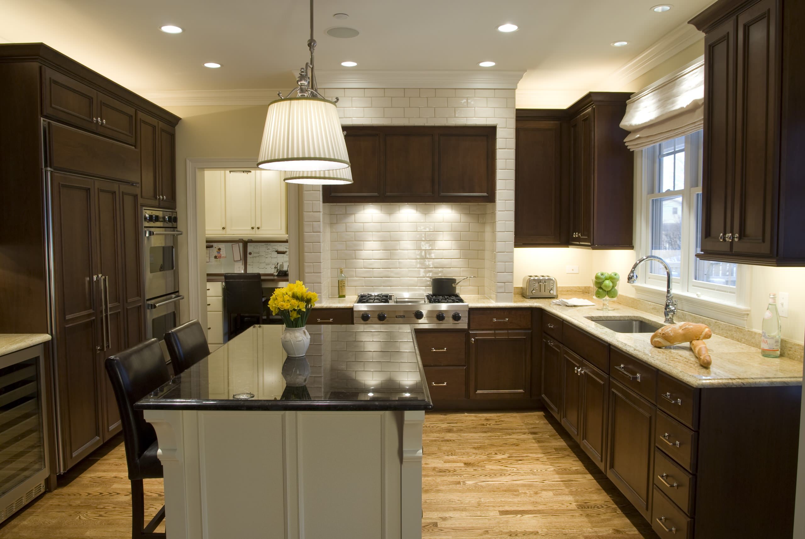 What color should i paint my kitchen with white cabinets in Traditional Kitchen? breakfast bar ceiling lighting dark wood cabinets eat in kitchen glass front cabinets kitchen island